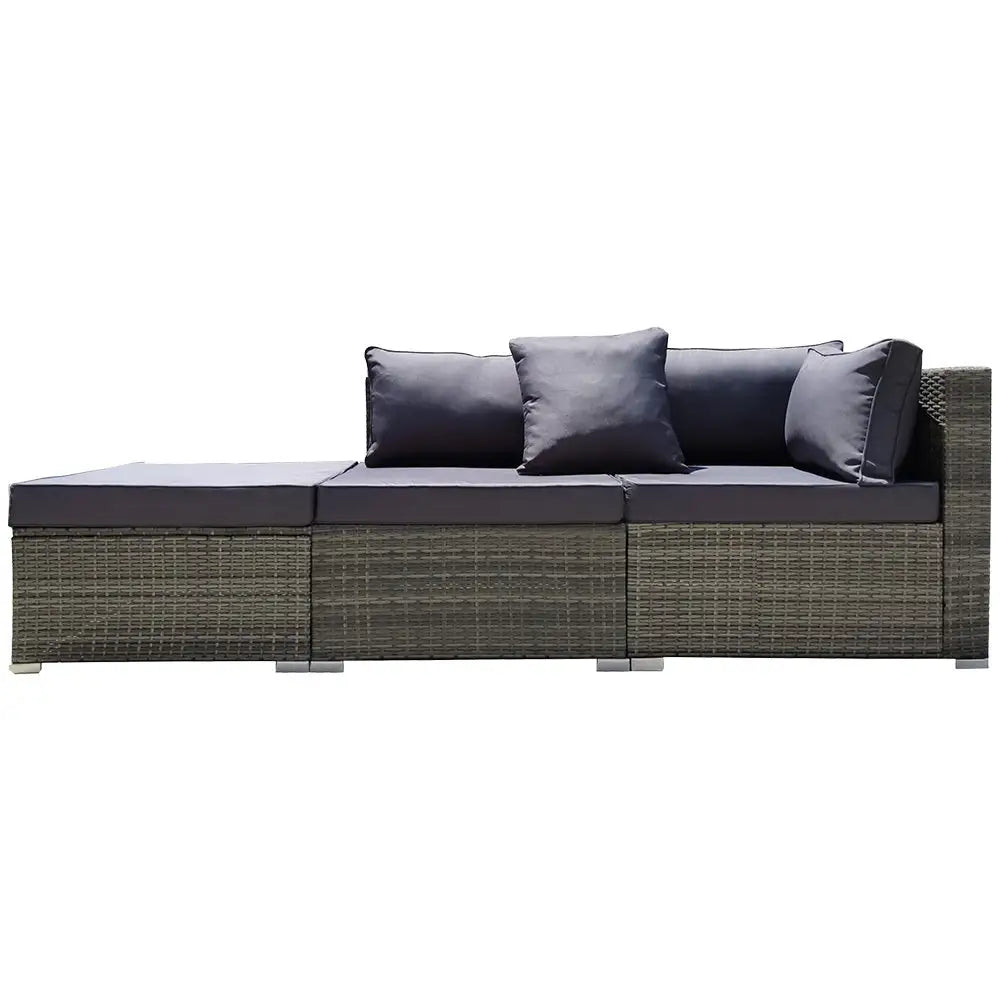 London rattan outdoor lounge setting - gray couch with pillows and ottoman