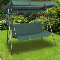 Modern outdoor steel swing chair with canopy in vibrant green color displayed in a garden