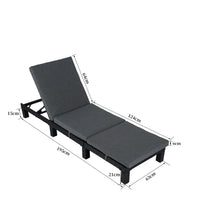 Outdoor rattan adjustable sunbed with black lounger and gray cushion close-up