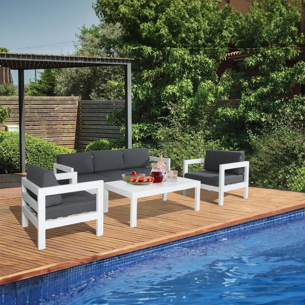Outdoor 3-seater sofa lounge with table on patio