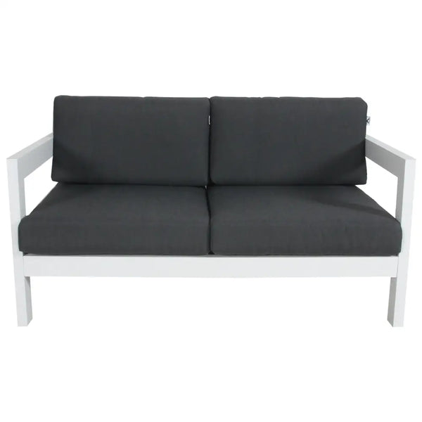 White wooden 3-seater outdoor sofa with black cushions in ’outie 2 or 3 seater outdoor sofa lounge aluminium frame - white’