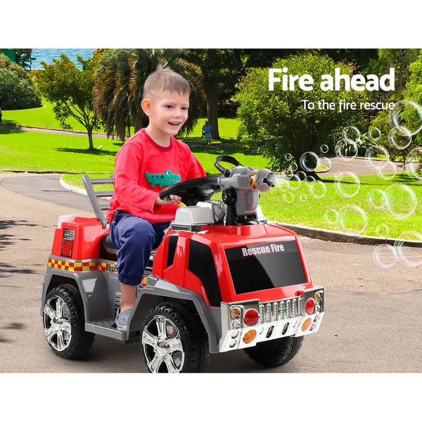 Rigo kids electric ride on fire engine fighting truck toy car - red, with a little boy riding and realistic driving experience