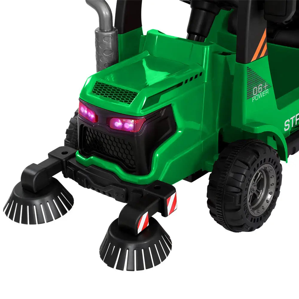 Green toy street sweeper truck with black and white background