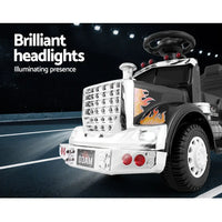 White toy truck with flames, rigo kids electric ride on truck 6v - built-in music and flashing lights