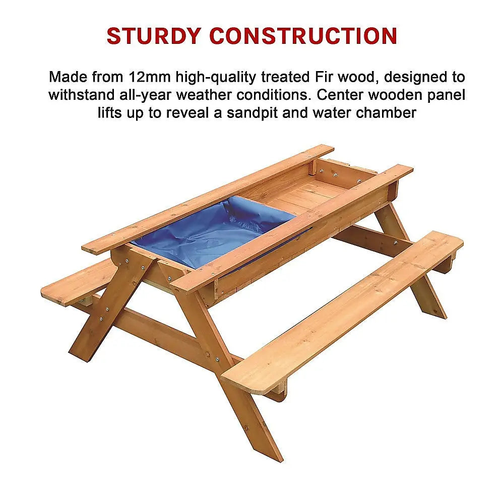 Wooden picnic table with blue cover by sand & water for young children enjoying outdoor play