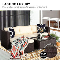 Sarantino 5pc outdoor lounge set with white couch and black/white blanket