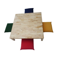 Square low table with four colorful cushions
