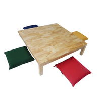 Square low table with two cushions and pillow
