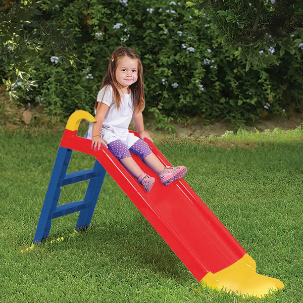 Young girl playing on children’s slide from starplay slide with ladder