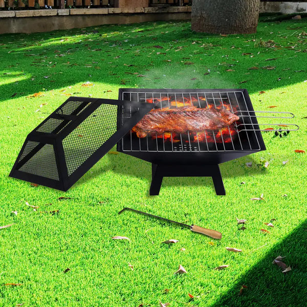 Wallaroo portable outdoor fire pit with bbq grill and steel frame on grass